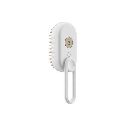 White steam brush with a loop handle shown in profile, revealing its cream bristle pad and the water-drop mist button